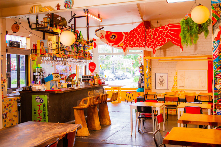 Bar seating at Chotto Motto, a Japanese restaurant in Melbourne with retro Showa-era style, izakaya vibes, and gyoza served fresh over the counter